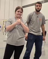 Collins and Partin compete at state archery tournament