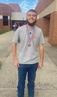 Williamstown’s Tanner Collins leads archery team to third place at regional tournament