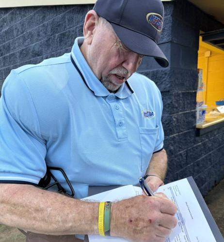 David Lane completes paperwork