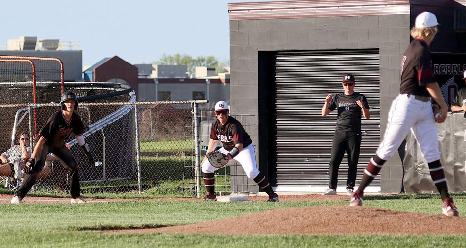 Dezarn's seventhinning triple lifts Rebels past Wildcats The News