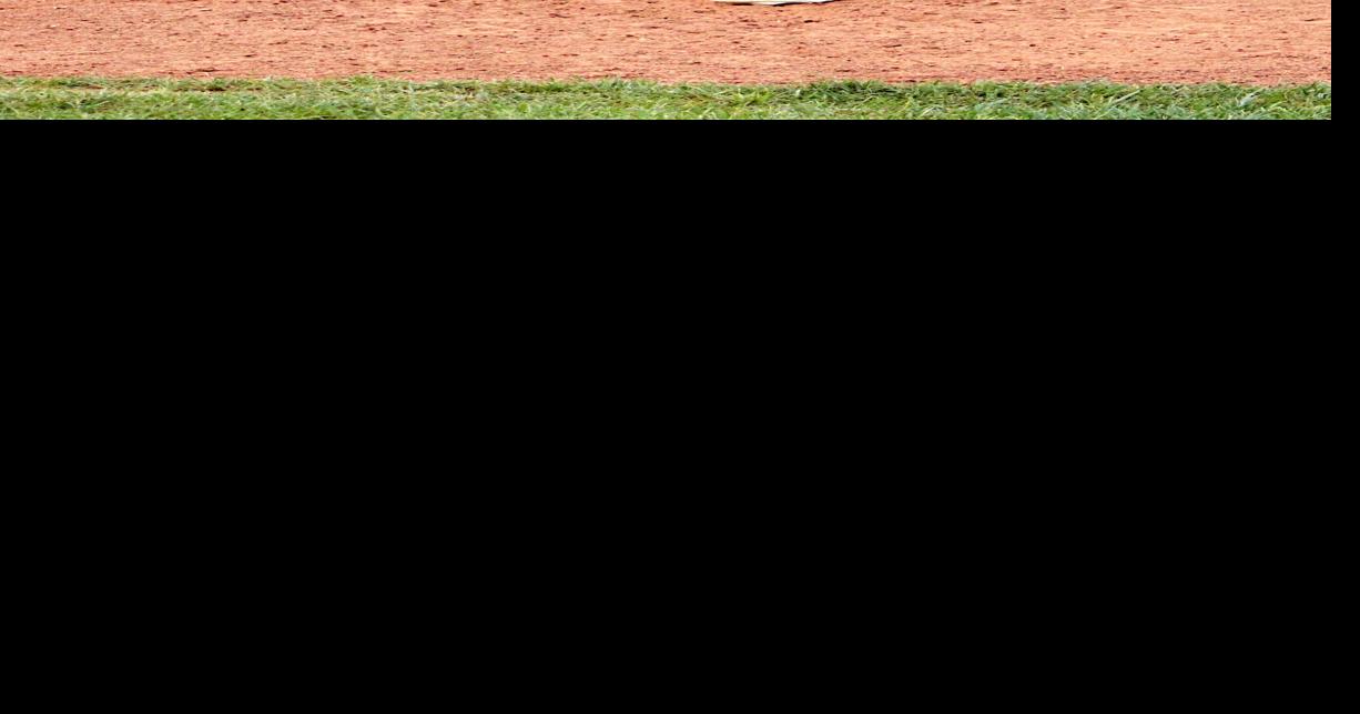 Dezarn's seventhinning triple lifts Rebels past Wildcats The News