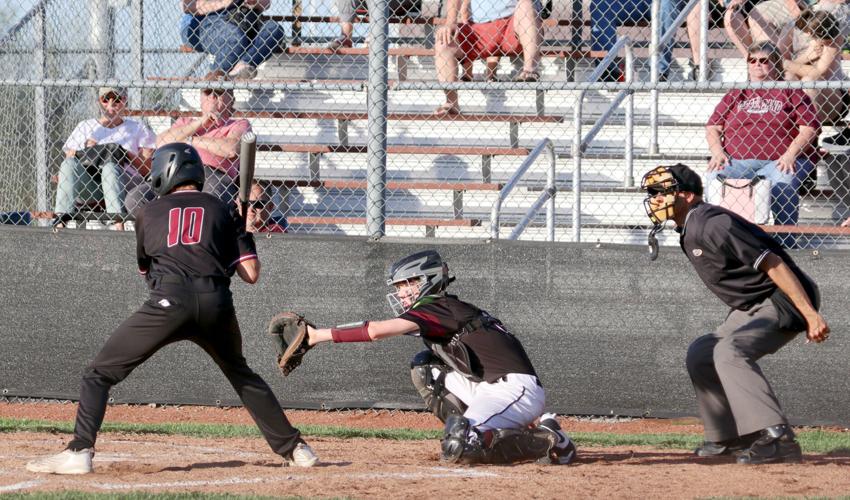 Dezarn's seventhinning triple lifts Rebels past Wildcats The News