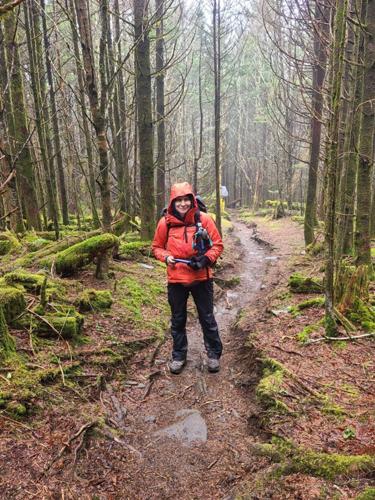Cindy Kinmon braves a cold, wet trail