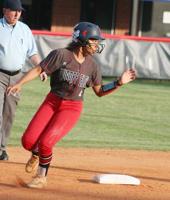 SF closes out Lady Demons, 7-4
