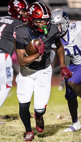 Demons 'hooked'by Redhawks in 2 OTs, 34-28