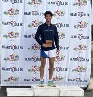 Lopez places first overall in Heart & Sole 5K