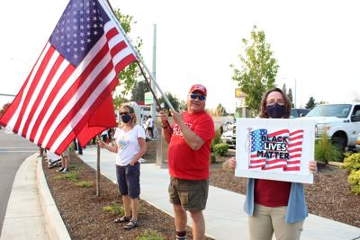 Why is the red and black flag, seen at rallies in support of