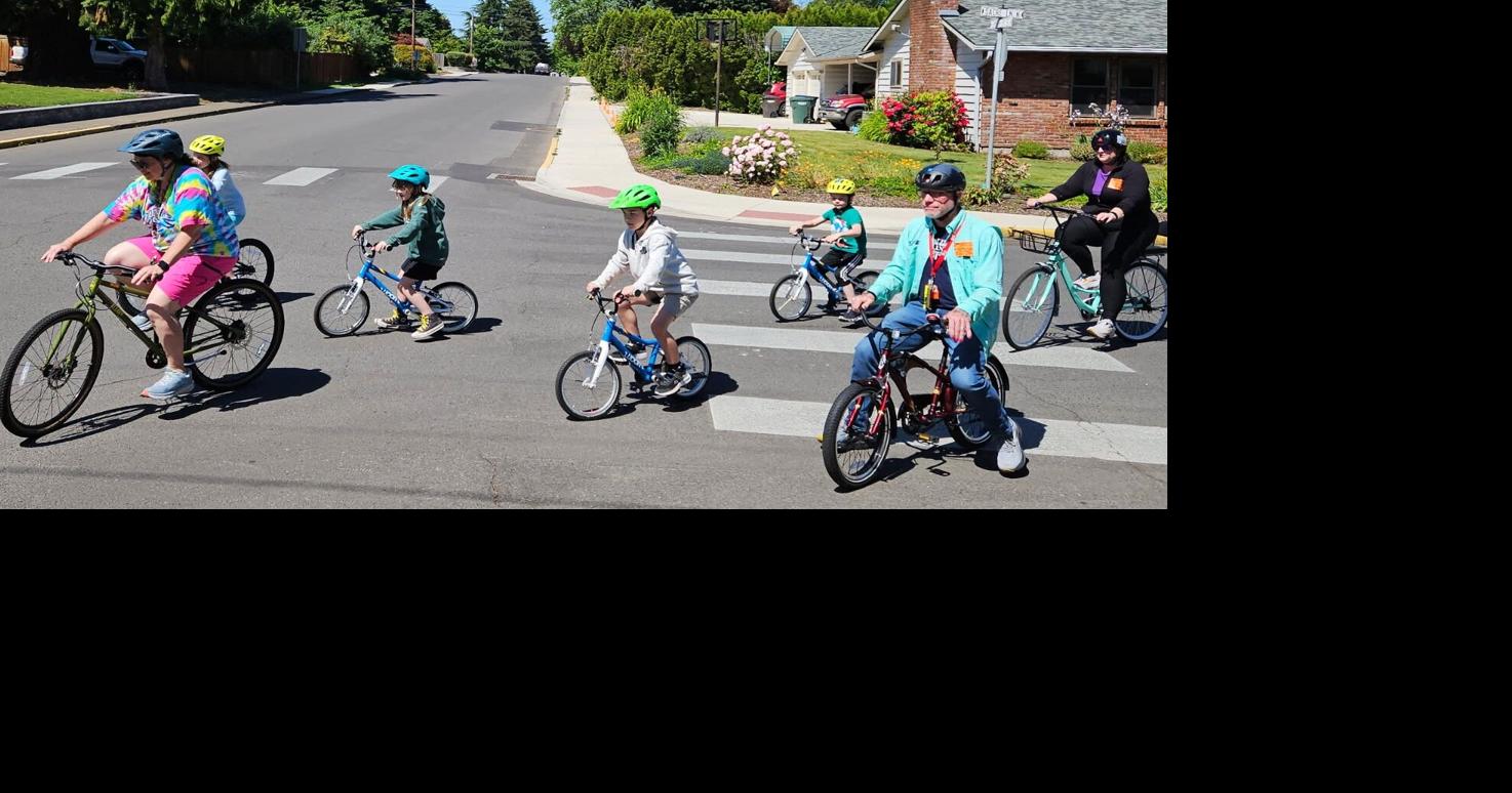 Elementary students learn the bicycle rules of the road