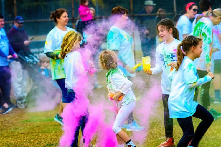 Mead Hall 5K rivals Mother Nature’s burst of spring colors Education