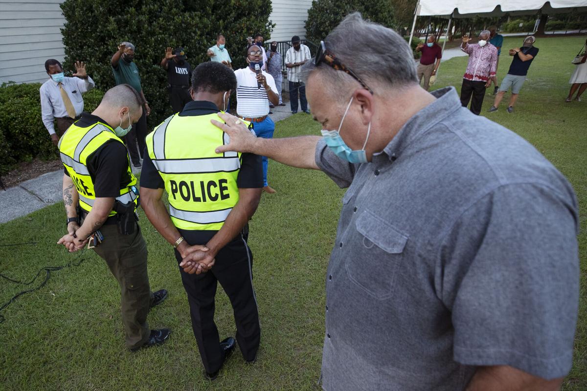 prayer with police.jpg