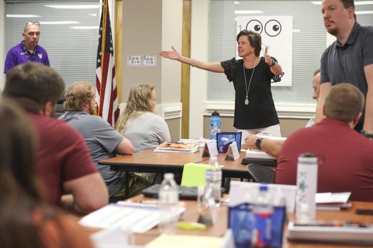 Photos: Greenwood 50 first year teachers train for the year round