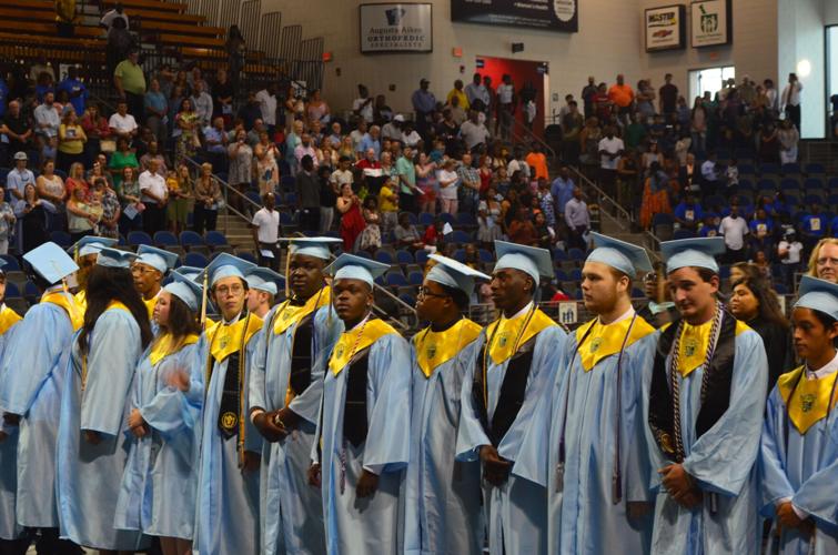 Graduates pause to appreciate the moment at Ridge