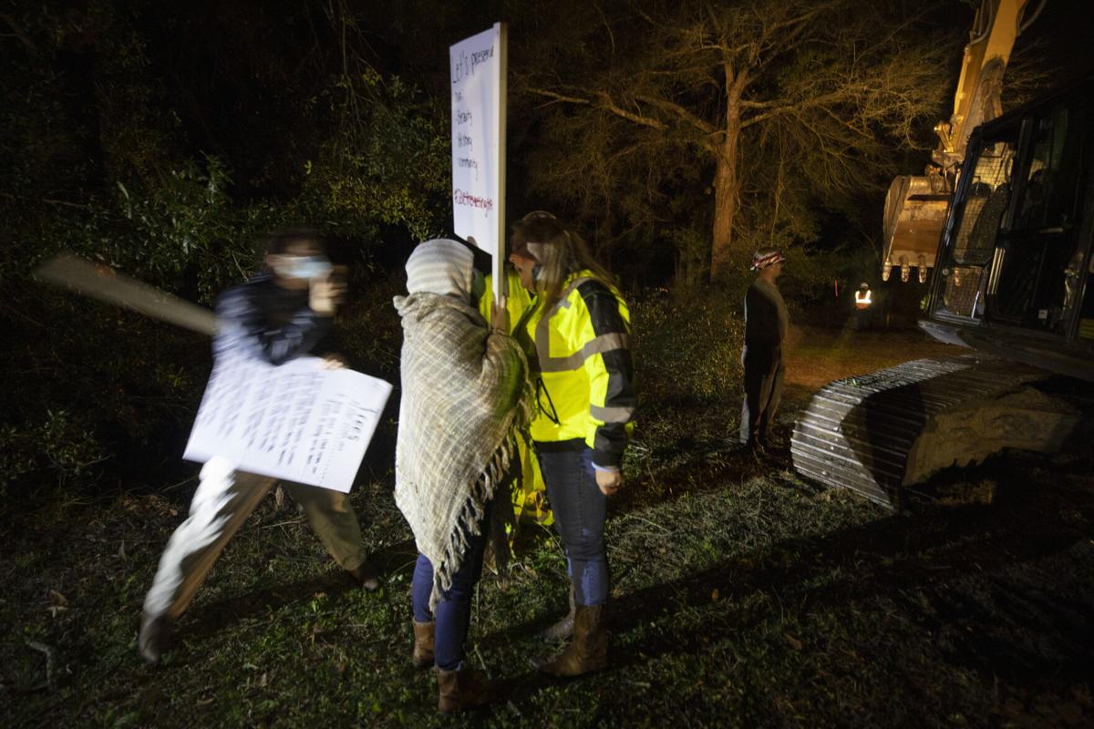 protestor and construction worker.jpg