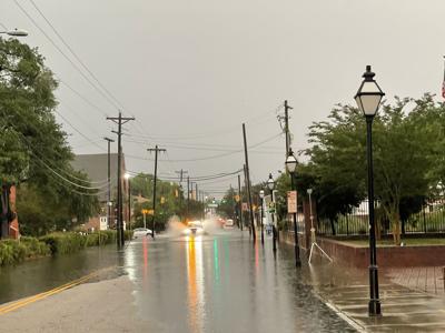 Heavy rain brings flooding, road closures to downtown Charleston