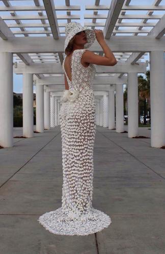 toilet paper crochet wedding dress Hello fellow crafters! Every year I compete in a contest where I make a wedding dress only using toilet paper, glue, thread, and tape (no other materials like fabric, buttons, zippers allowed)