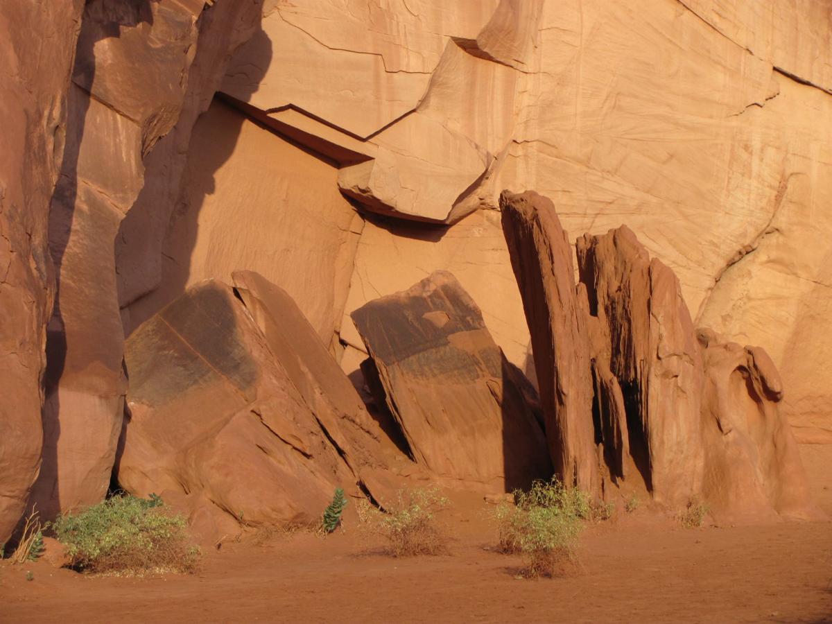 A geometric jumble of rock in lowering sunlight