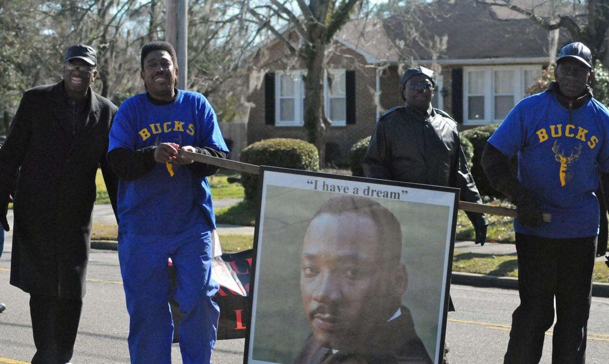 ‘The color of unity is love’ MLK celebration, parade captures catch