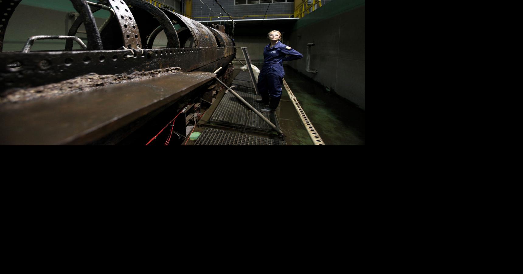 Scientists find human tooth inside H.L. Hunley submarine during cleanup