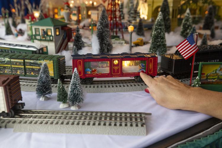 Photos The only Artist to paint Lionel Trains and her personal model