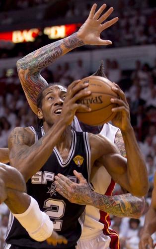 Sources: Spurs star Kawhi Leonard expected to miss remainder of
