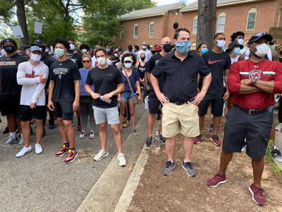 Usc Football Coach Players March To Sc Governor S Mansion For