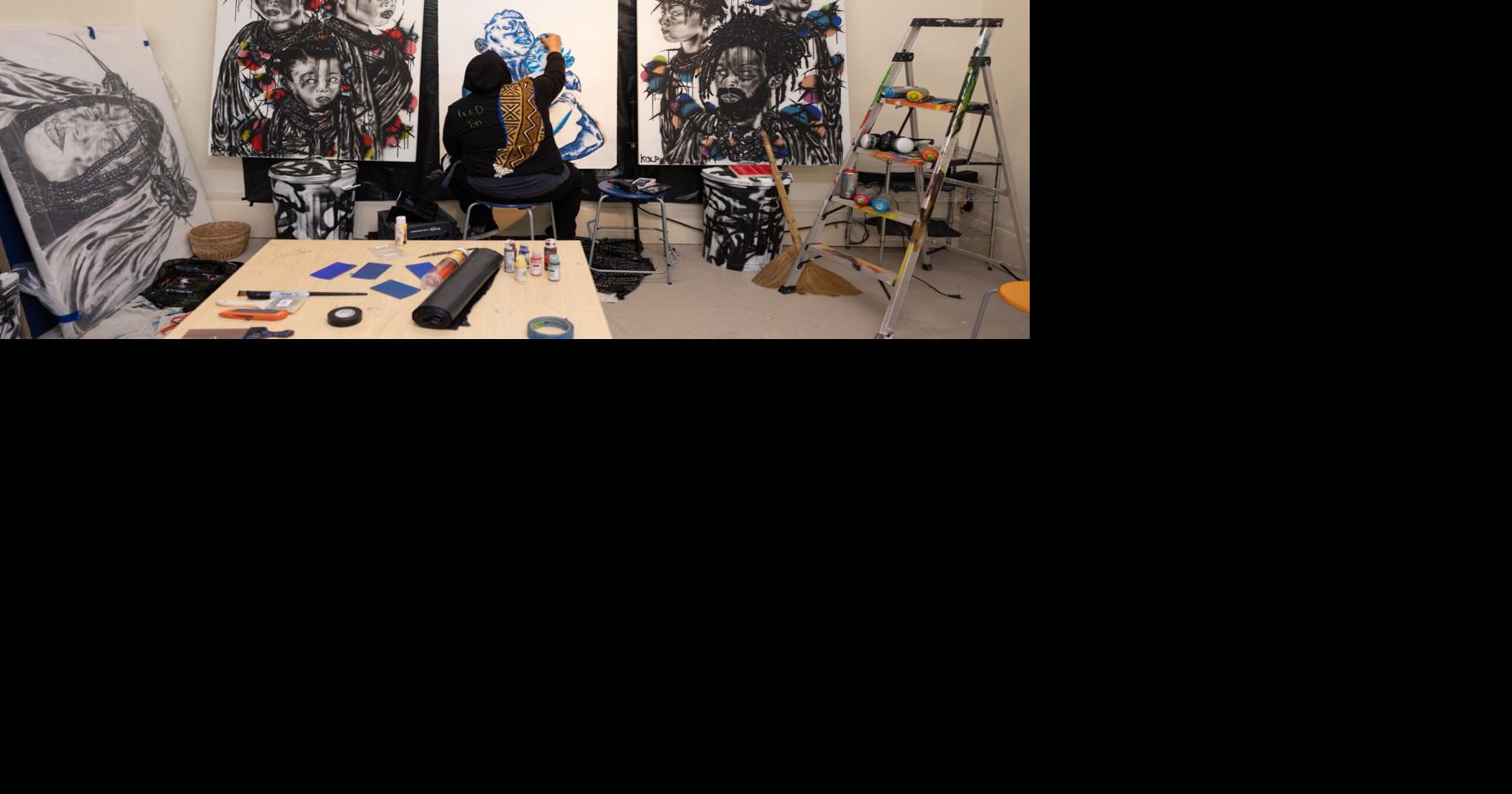 An SC artist who paints with fire has an exhibit at the Gibbes about the Black American experience