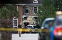 Florence shooter had nearly 130 guns, giving officers 'no chance' in ambush, sheriff says