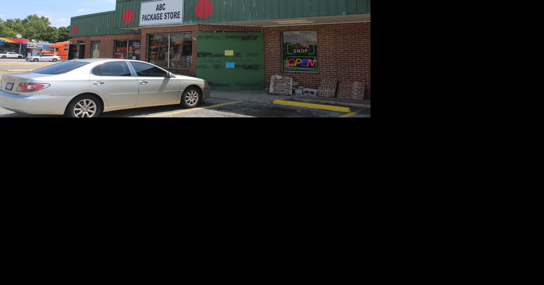 Aiken liquor store building hit by car but it is still open for business