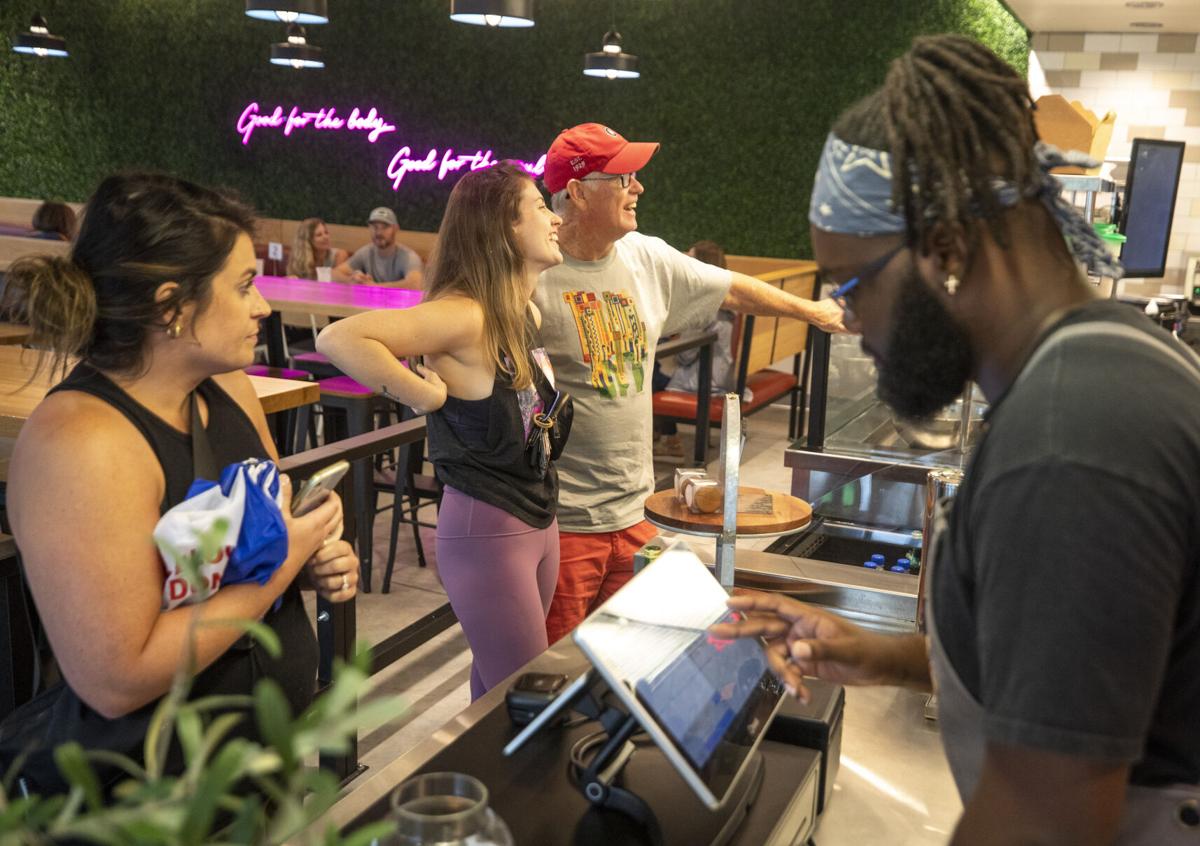Pasture & Grain Family Ordering Food.JPG