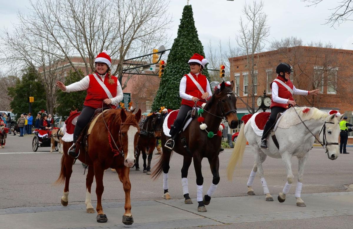 Hoofbeats and Christmas Carols Parade decks downtown Aiken with holiday