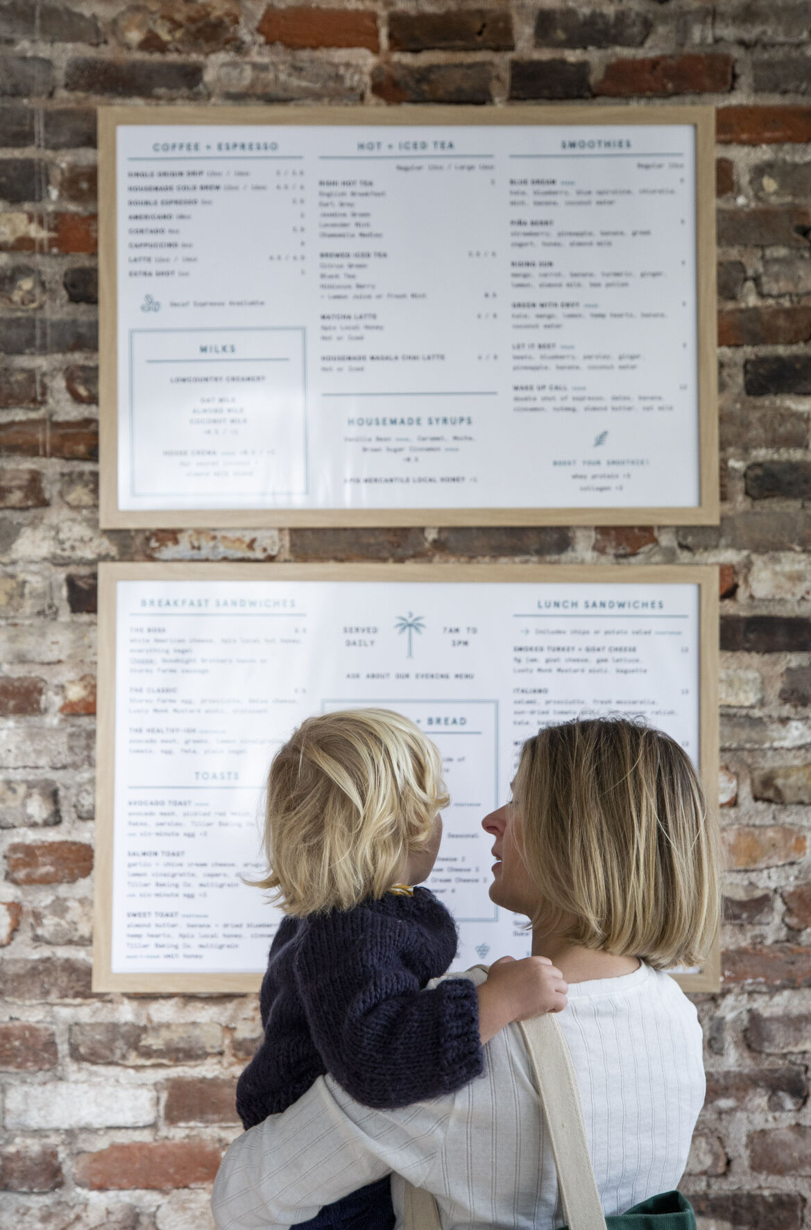 Island Provisions Mother and Son Looking at Menu.JPG