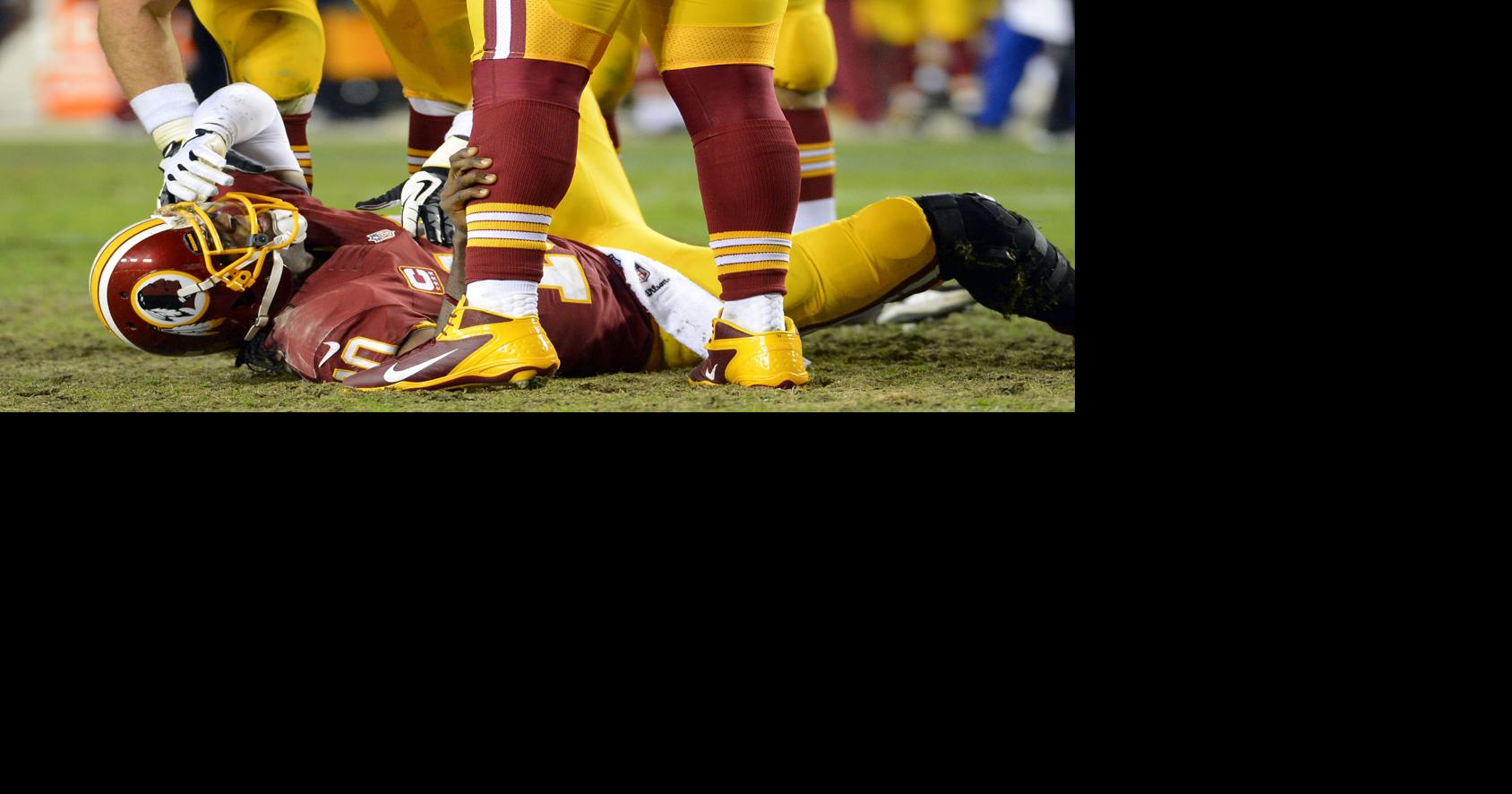 RG3 knee injury: Coach Mike Shanahan should not have let him play