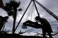 Desperate dig for the past under way on disappearing SC island