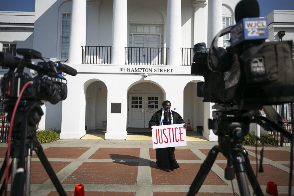 Reverend With Justice Sign.JPG