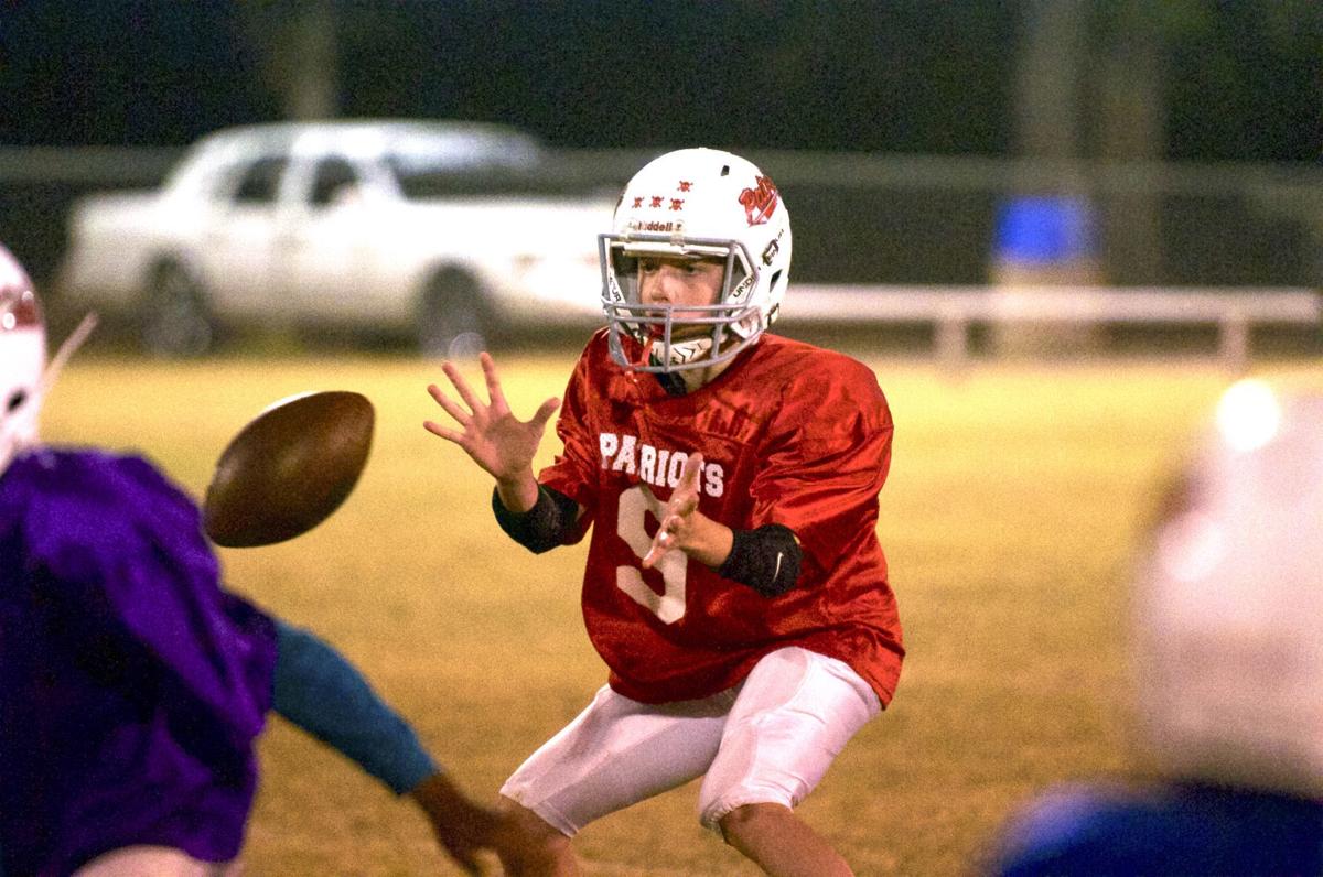 Youth football quarterback leads team to winning season, despite disability