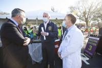 mcmaster and hospital officials.jpg