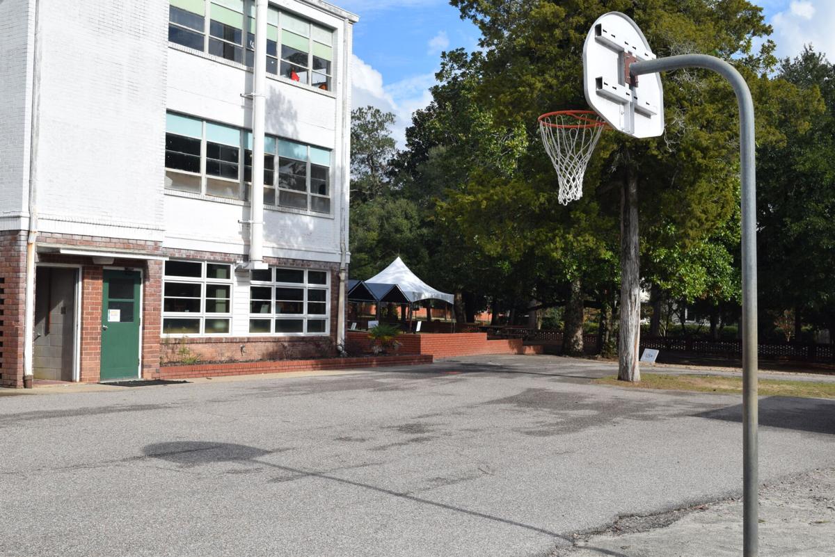 Mead Hall Episcopal School completes basketball court, receives