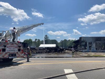 Early morning fire under investigation in Andrews, two businesses destroyed