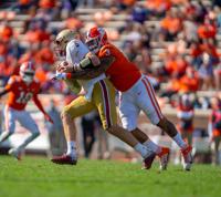 As Clemson's Lawrence remains in virus isolation, teammates' recovery can be instructive