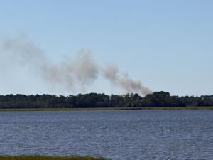 Fire crews fight blaze on Ashley River railroad bridge in Charleston