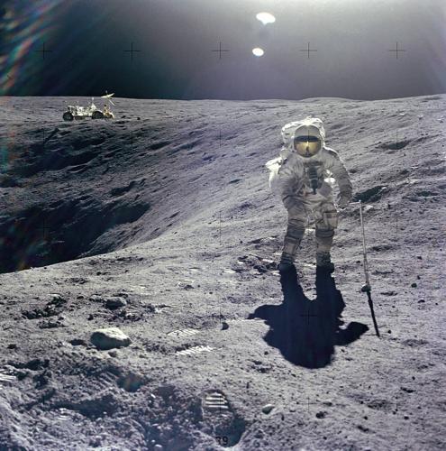 Charles Duke collecting lunar samples on the Moon at the Descartes landing site - Courtesy of NASA.jpg