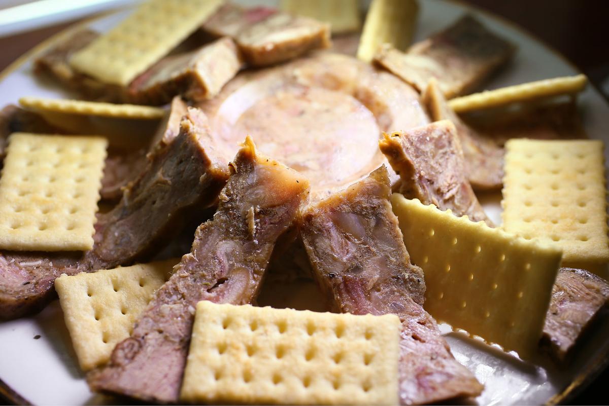 Hog head cheese rears up on the East