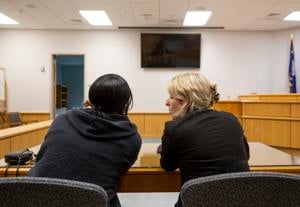 Housing Court Attorney Speaking to Tenant.JPG (copy) (copy) (Copy) (Copy)