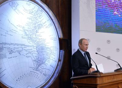 Putin strikes defiant tone in Palmyra