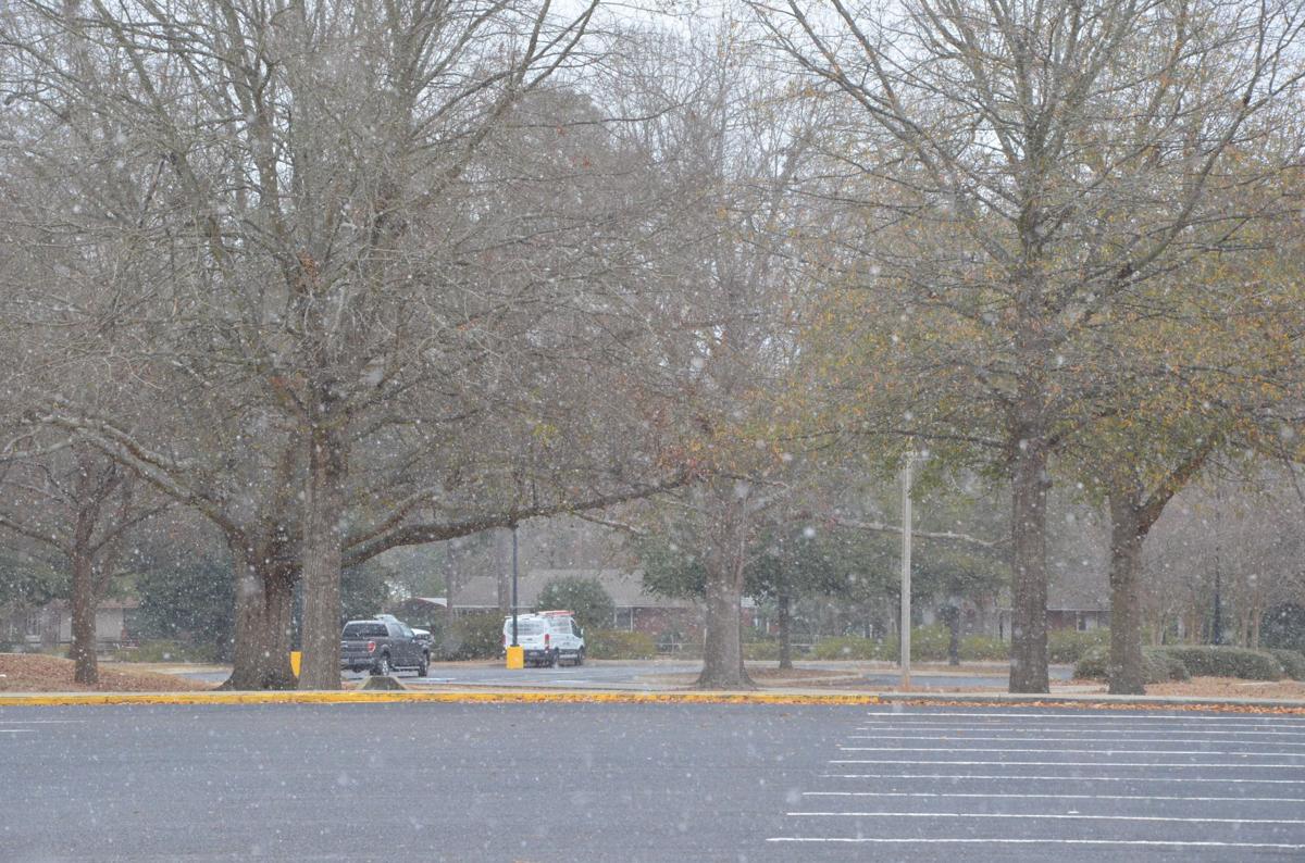 Snow Flurries Swirl In Aiken County News Postandcourier Com When designing a new logo you can be inspired by the visual logos found here. snow flurries swirl in aiken county