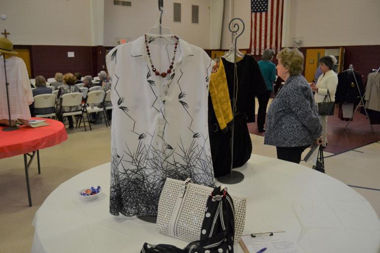 Designer handbags auction helps raise money for Hospice South