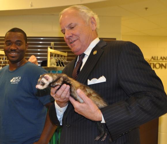 McMaster visits Albrecht Center for ceremonial signing of animal