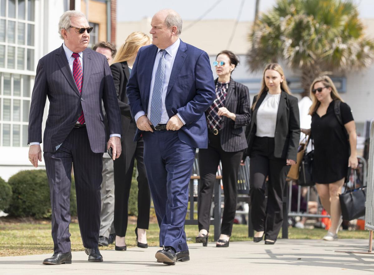 Defense Lawyers Walking to Presser.JPG
