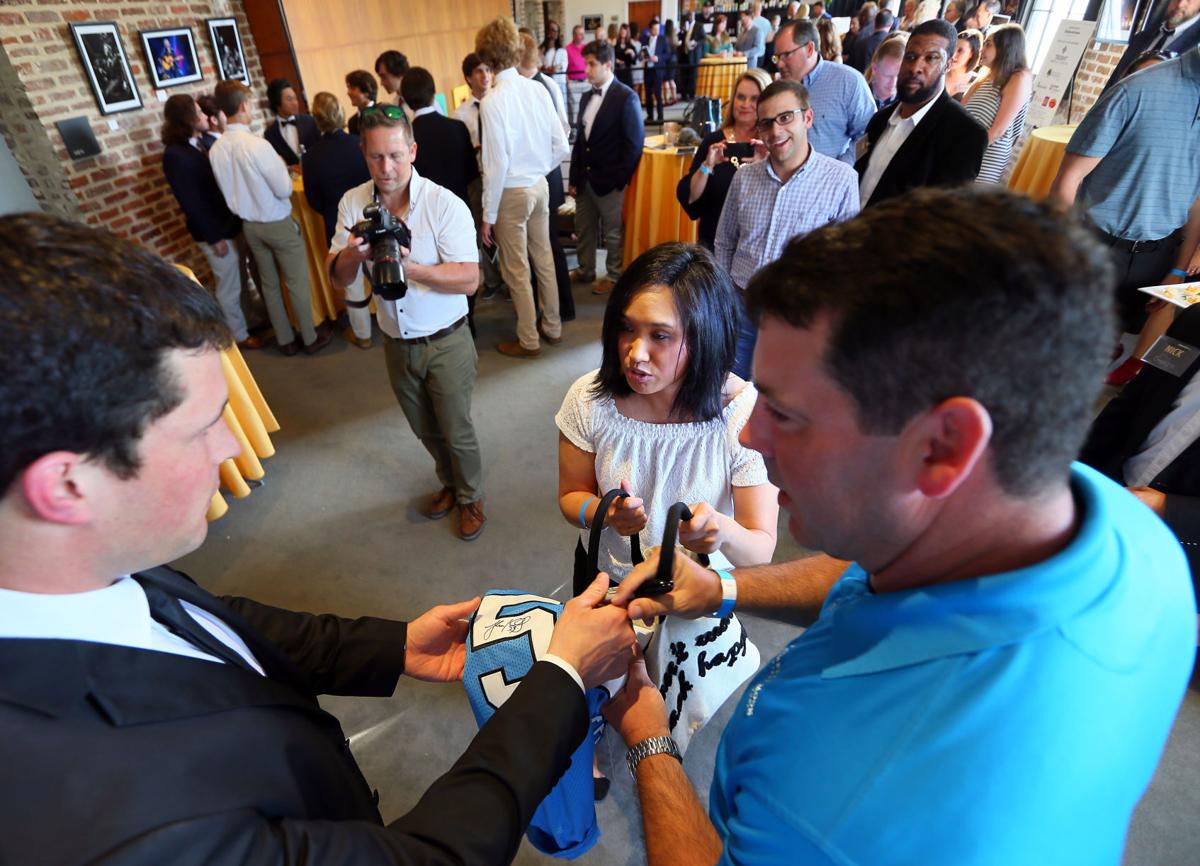 autograph kuechly CHARLEYS.jpg