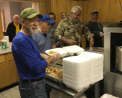 Georgetown Knights of Columbus distribute free Thanksgiving dinner